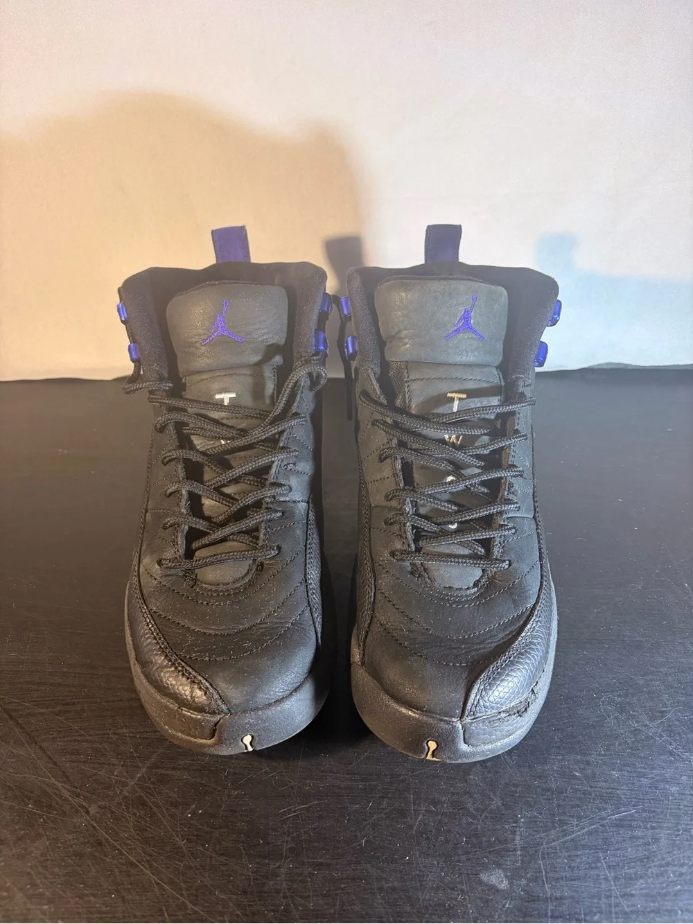 Men's Jordan 11 Black High-Top Athletic Sneakers with Purple Accents
